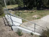 Interclamp key clamp fittings and tube used to construct a guardrail around a culvert